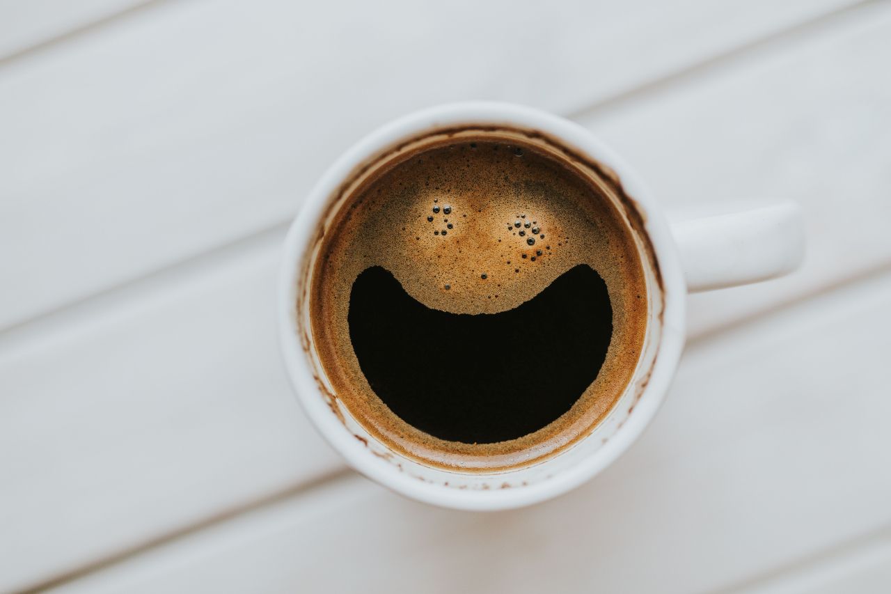 Coffe on a table with other items