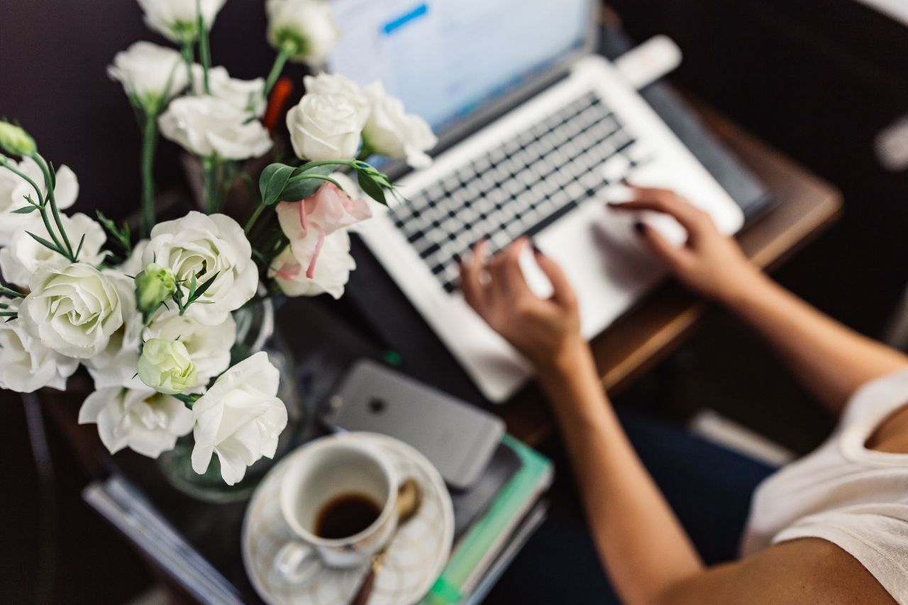 Woman working on laptop at home office